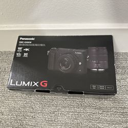 NEW Panasonic Lumix DMC-GX85W Camera Kit (Black) w/ Two Lenses And More