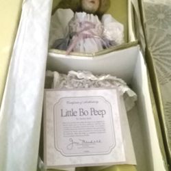 2 Porcelain Dolls