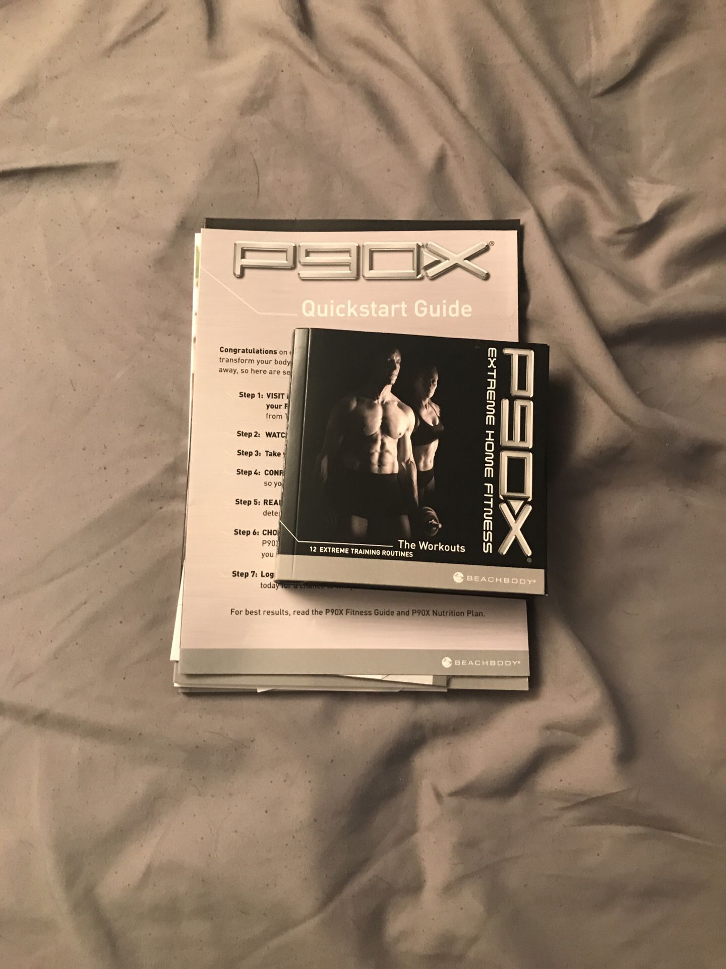 P90X DVDs, fitness guide, and nutritional planner