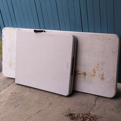 2 long white party tables...used one folds..