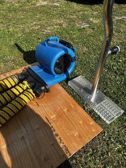 Water damage drying equipment- fan with hose adapter and free water extraction tool