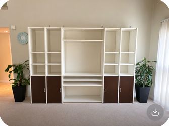Large White and Brown Entertainment Center Wall Unit