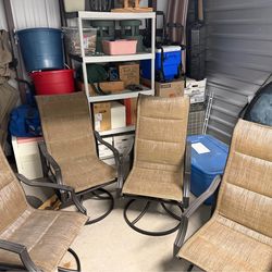 Round glass table with 4 swivel chairs