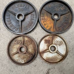 Olympic Weights 35s And 25s In Solid Condition Workout Weights