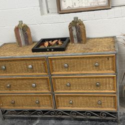 Beautiful wicker and metal dresser — six spacious drawers with a rustic charm! Perfect for a bedroom
