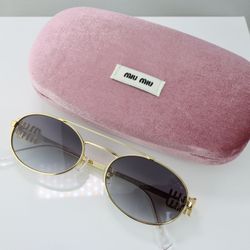 Miu Miu Oval Sunglasses in Gold with Gray Lens