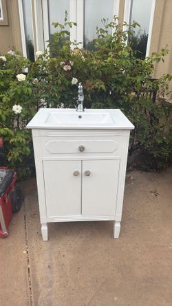 Bathroom vanity and faucet