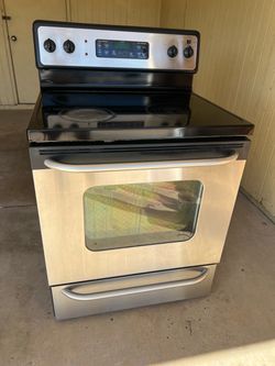 GE stainless steel 30” free standing electric range 4 burner cooktop includes power cable