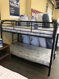 Bunk bed with mattresses