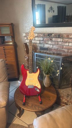 Candy Apple Red Squire by Fender(Affinity) Strat. (Just south of Mint condition)