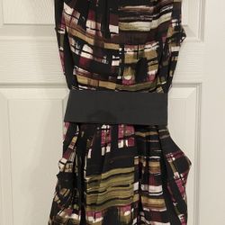 Nice Dress With Belt and Pockets On Each Side  $15.00