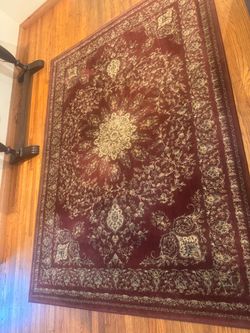 Burgundy Traditional Oriental-style Rug. Approx. 5’6” x 7’9”