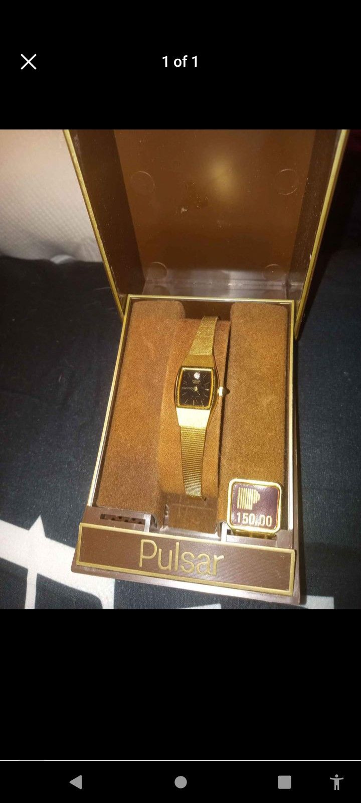 Pulsar ladies gold watch quartz with a diamond on the face
