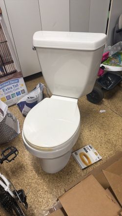 Three free toilets-1 kohler and 2 glacier bay