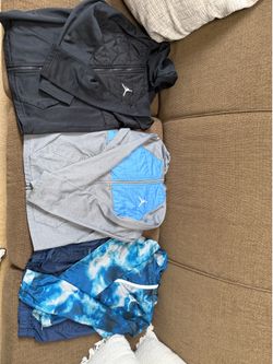 Three Jordan zip ups