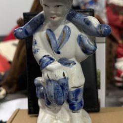 Chinese Blue And White Porcelain Figurine of a Fisherman