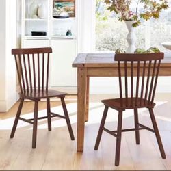 2X Brown solid wood dining chairs