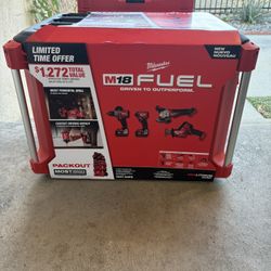 Milwaukee Packout. Rolling Tool Box W/ M-18 Fuel 4- Tool Combo Kit. 3697-24PO