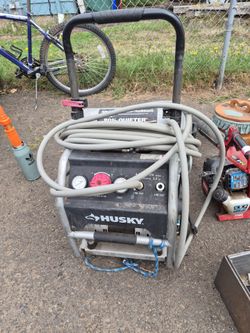 Quiet compressor with hose and air chuck