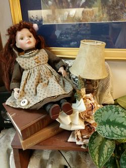 ANTIQUE DOLL ON STOOL WITH LAMP