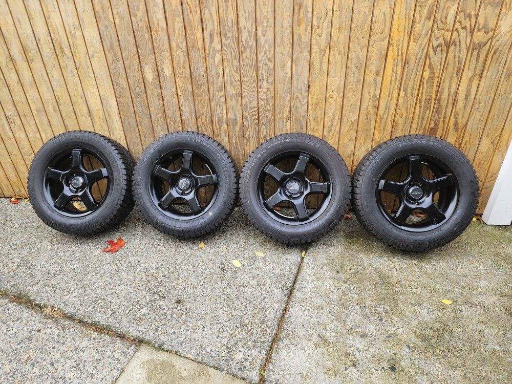 16" Chrysler Town&Country Snow Wheels and Tires for Sale in Everett, WA