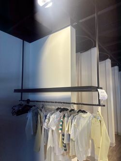 4 custom made hanging ceiling clothing racks