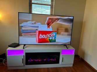 70 inch TV white fireplace w/LED Lighting.