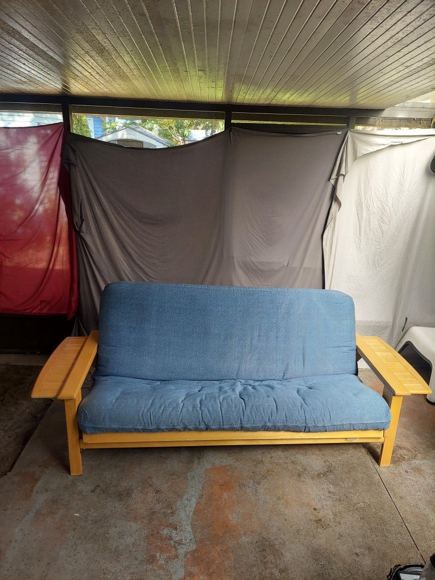 Wooden Framed Futon With Fold out side Tables