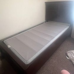 Twin wooden bed
