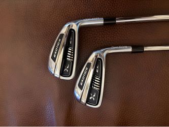 2 new golf clubs, $25 each
