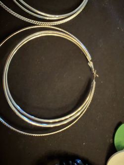 Silvertone large hoop earrings