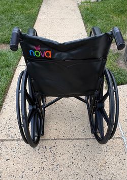 Nova Wheelchair – 20” Wide Seat – Includes Footrests – Excellent Condition