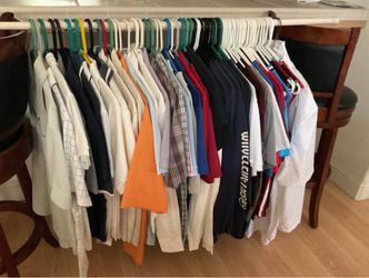 Young  men's  tops  (t-shirts, tank tops, polo shirts) -  $.50  each