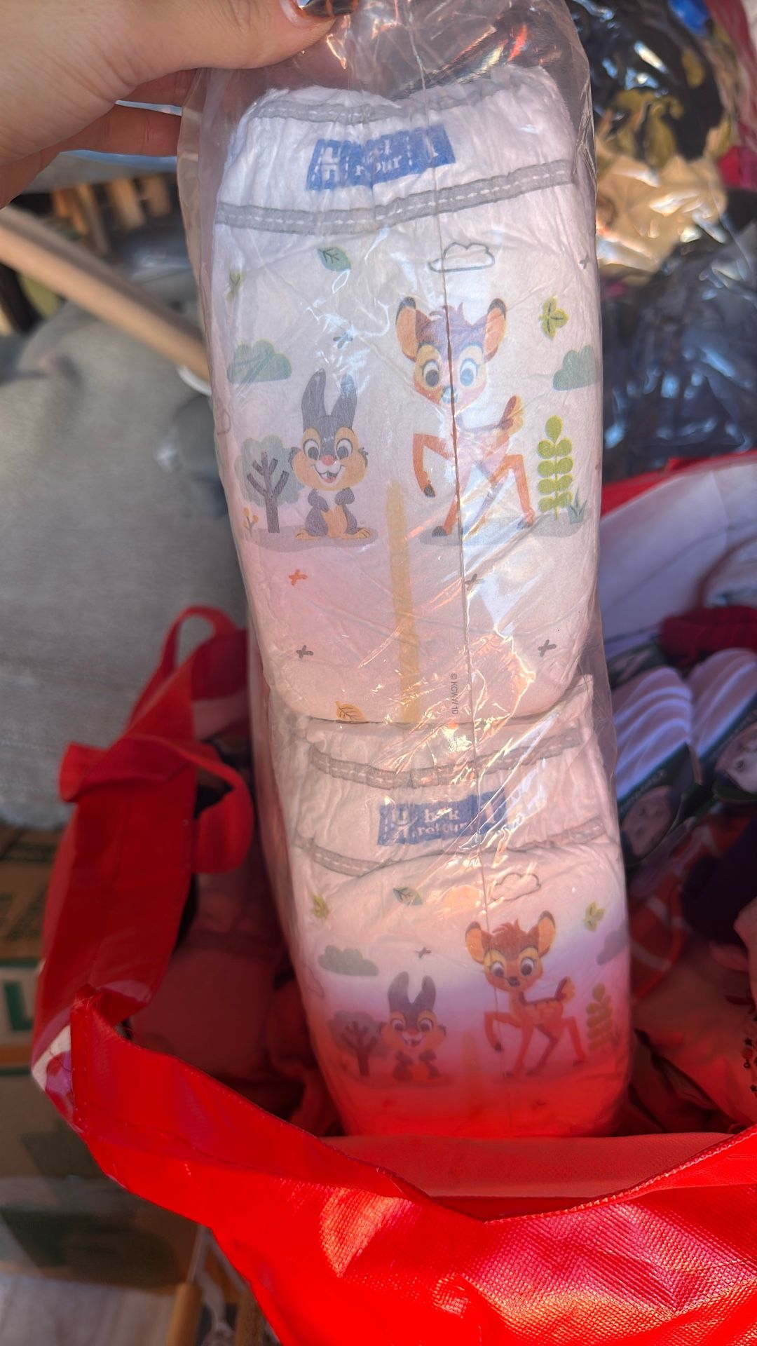 4 ROWS OF SIZE 1 Diapers 