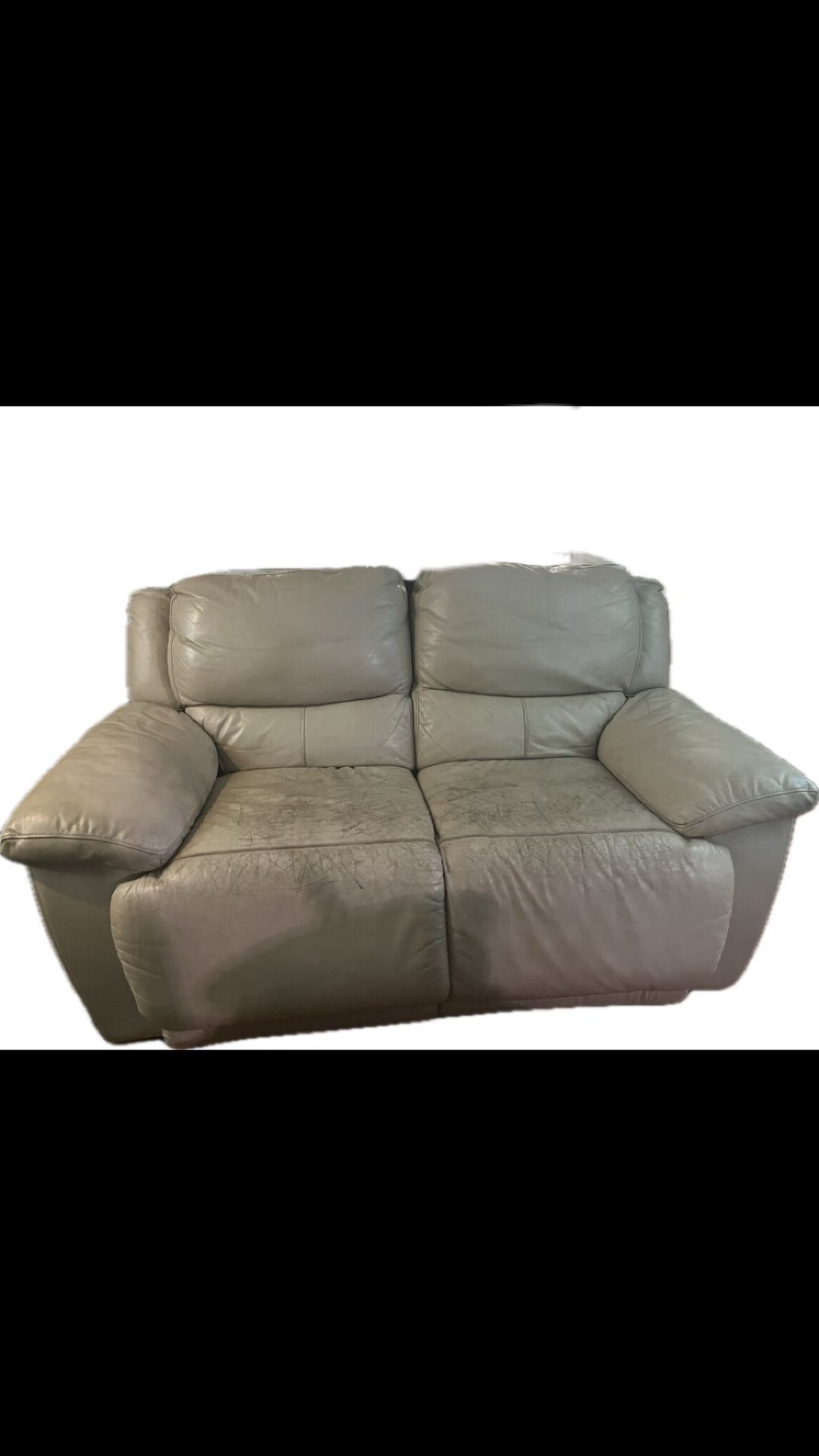 Tan Reclining Leather Loveseat 
