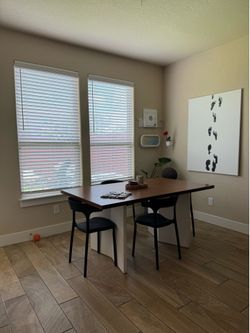 Set of four black dining chairs
