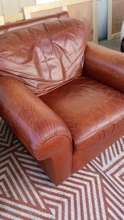 Brown leather personal couch