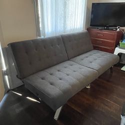 Futon from Ashley's Furniture Lightly Used (mainly to just put stuff on it)