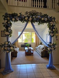 Gold white and blue flower arch