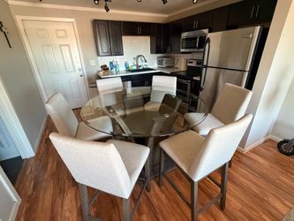 Glass top dining table