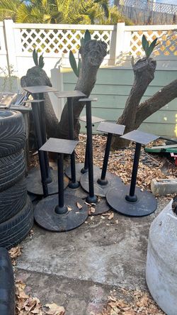 11 heavy metal table bases  $200