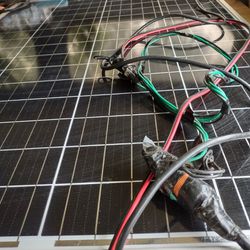 Solar Panel And A Jackery And Switch charger/Inverters