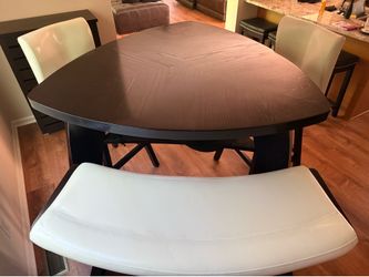 Brand new four piece dining room set bar height includes swivel barstools and bench