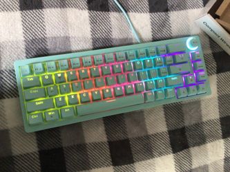 65% Compact Mechanical 68 Key Keyboard, Wired, Rainbow Lit, Mint Green. Red switches for smooth, quiet strokes.
