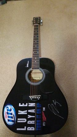 Autographed Luke Bryan Huntington acoustic guitar