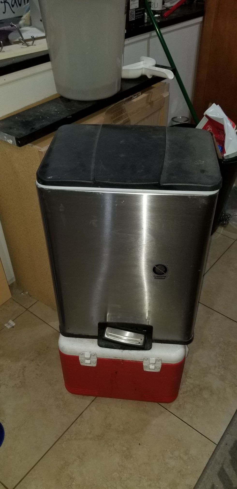 Stainless steal garbage can.