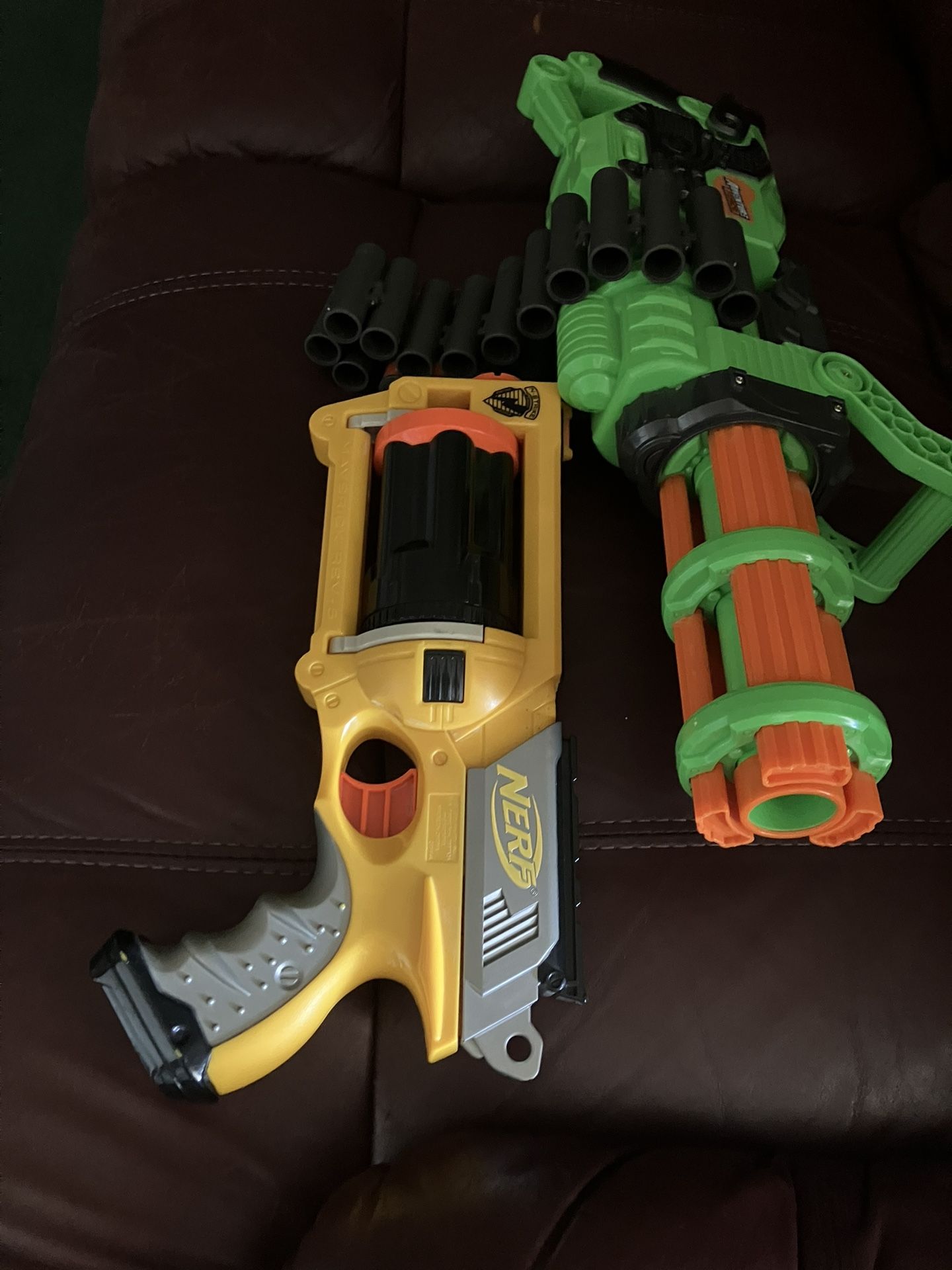 Nerf guns one takes batteries the large one does no bullets