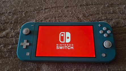 Switch lite Turquoise with Zelda Case