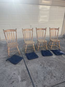 Wooden set of four dining chairs