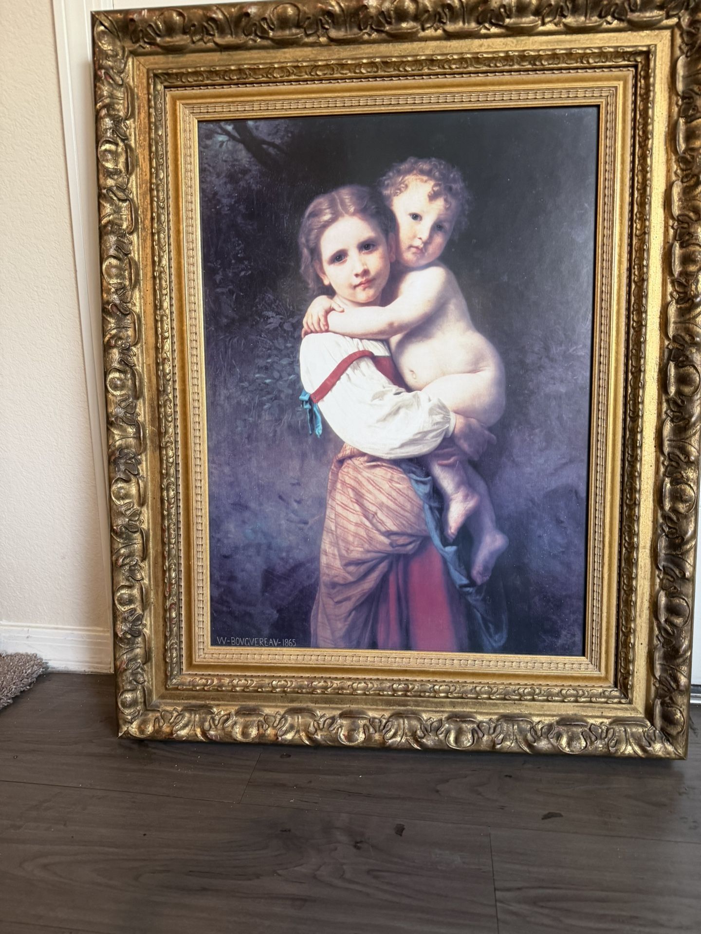 Ornate gold frame with a classic painting by W. Bouguereau from 1886.